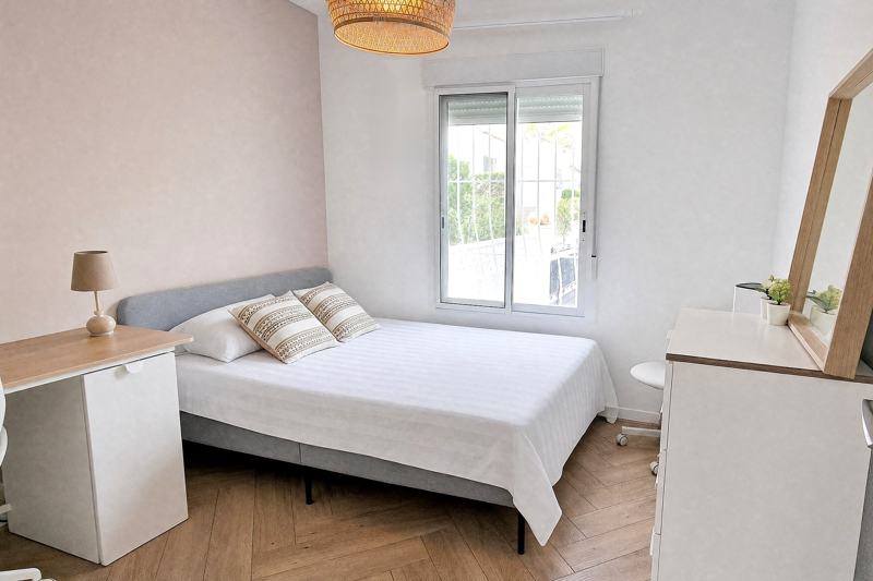 The same bedroom without the dreamcatcher